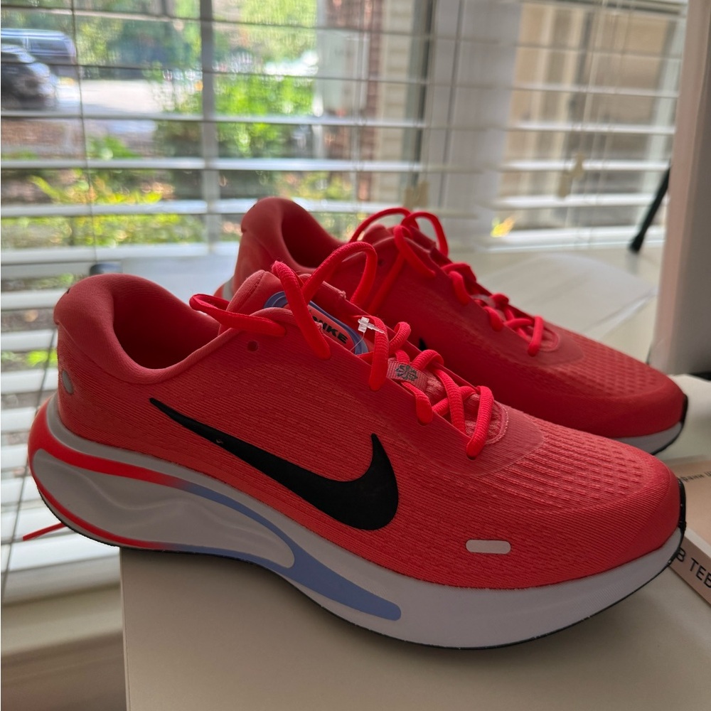 Nike Running Journey Run trainers in orange